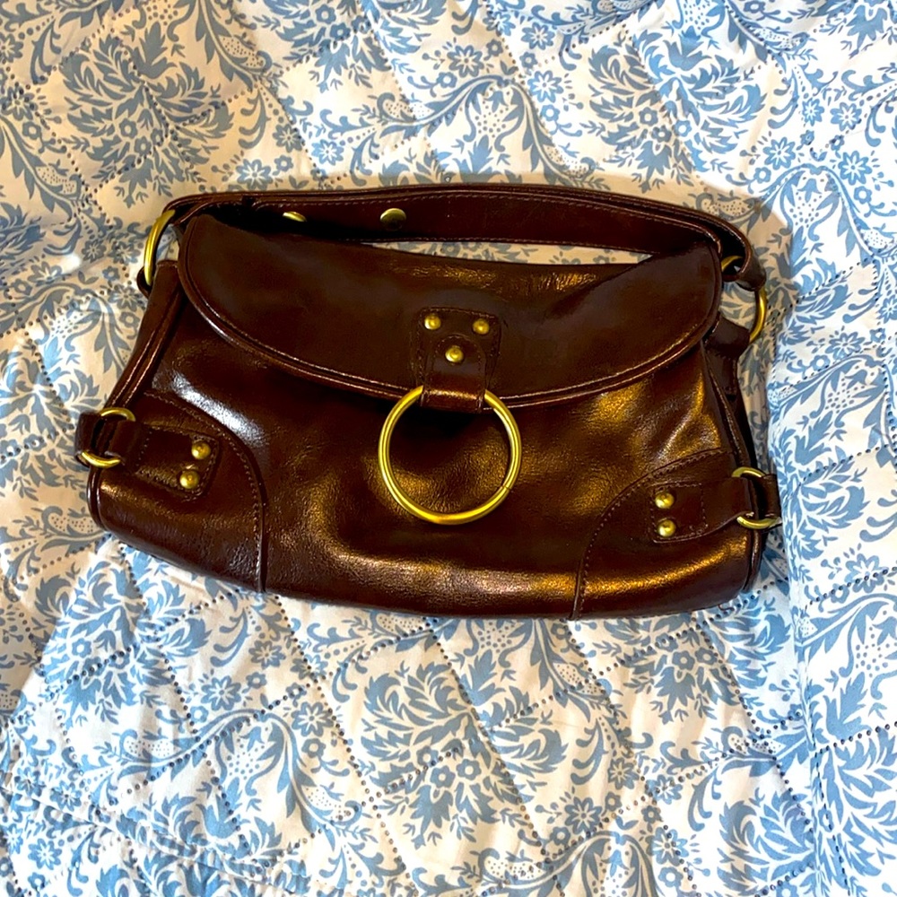 Vintage Nine West Genuine leather mini shoulder bag. Some separation on top fold